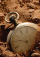 old_pocket_watch_buried_1774093